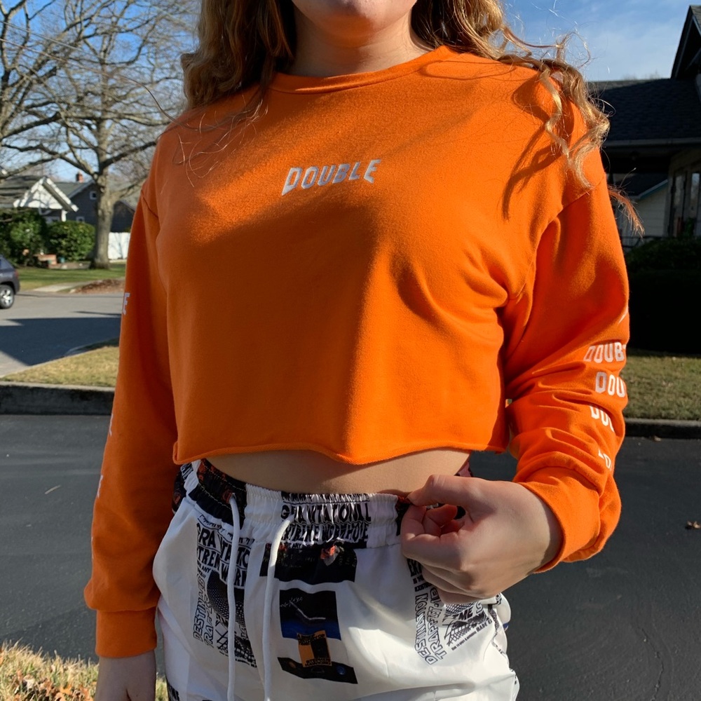 Neon orange cropped long sleeve shirt